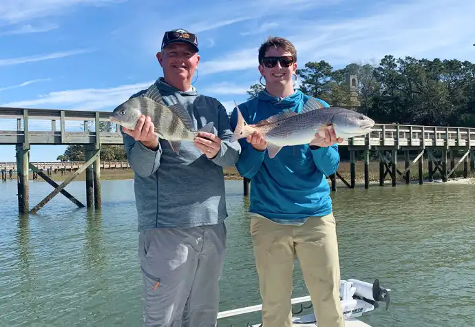 Father and son showing sheepshead and redfish on a Hilton Head fishing charter